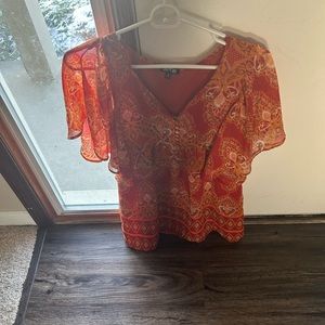 It is a women shirt apt9